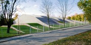 Krytý plavecký bazén v Litomyšli - Nominace na titul Stavba roku je udělena za vytvoření přátelské sportovní stavby se zřetelem k netradičnímu pojetí zelených střech.